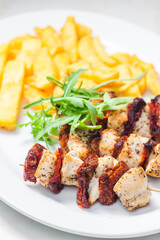 skewers with dry tomatoes and poultry meat