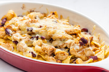 nachos with chicken meat, red beans and cheese
