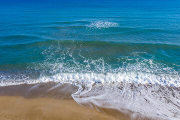 Amazing beach with azure water. View of   sand on turquoise beach in North West, Crete island, Greece.