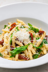 pasta with dry tomatoes and spinach