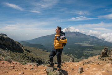 Hiker in the snowy mountains