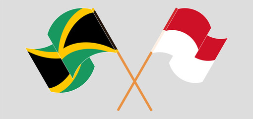 Fototapeta na wymiar Crossed and waving flags of Jamaica and Indonesia