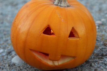 Halloween pumpkin carved with a scary face