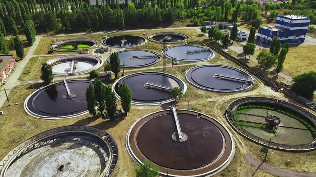 Sewage treatment plant. Sedimentation round basin or clarifier in modern sewage or wastewater treatment plant