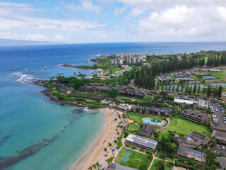 Aerial view of tropical destination with white sand and turquoise water. Kapalua coast in Maui, Hawaii. 