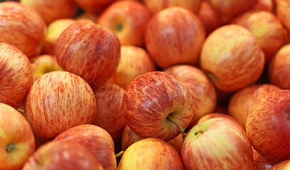 Close-up view of organic red apples in supermarket.