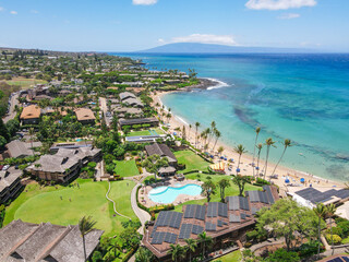 Aerial view of tropical destination with white sand and turquoise water. Kapalua coast in Maui,...