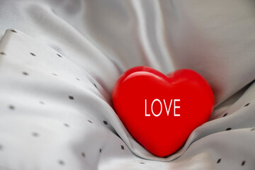 beautiful red heart on silk fabric