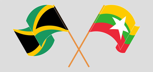 Fototapeta na wymiar Crossed and waving flags of Jamaica and Myanmar