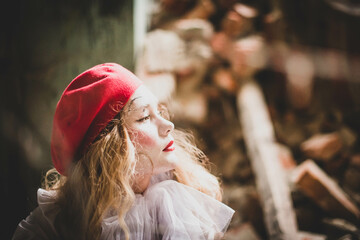 The girl with makeup of the mime. improvisation. Suit for Halloween. mime shows different emotions....