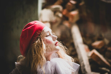 The girl with makeup of the mime. improvisation. Suit for Halloween. mime shows different emotions....