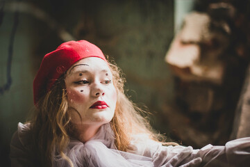 The girl with makeup of the mime. improvisation. Suit for Halloween. mime shows different emotions....