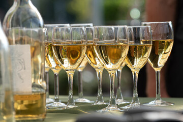 Summer celebration with Glasses of White Wine on Table