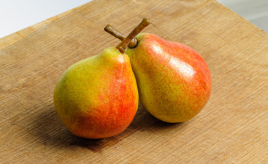 two pear on wooden table