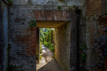 Doorway in Hill Gardens, Hampstead Heath, on a sunny summer afternoon, London, England