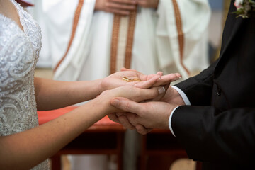 hands of bride and groom