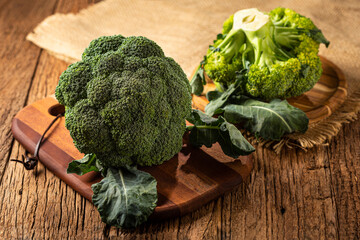 Green organic broccoli on the table.