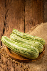 Green italian zuchini on the table.
