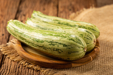 Green italian zuchini on the table.