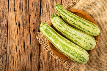 Green italian zuchini on the table.