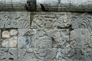 Ancient stone wall in Chichen Itza, Mexico