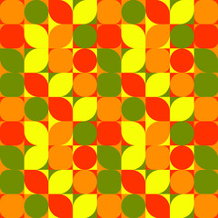 Geometrical seamless pattern of leaves, petals circles and squares shaped tiles. Abstract yellow, orange and green vector background. Autumn design for banner, poster, card, cover,invitation,wallpaper