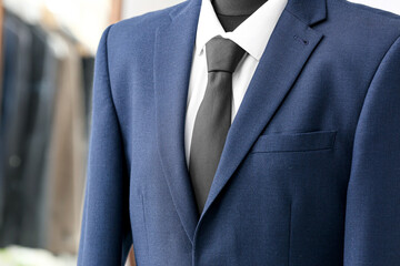 Mannequin with male clothes in boutique, closeup