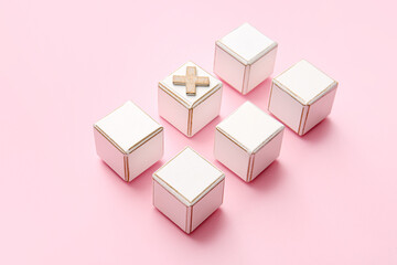 Wooden cubes on color background. Concept of uniqueness