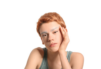 Teenage boy with dyed eyebrows on white background