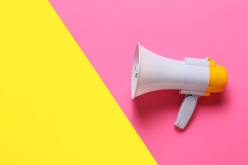 Modern megaphone on color background