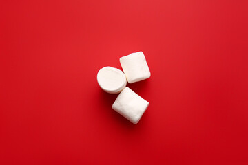 Tasty marshmallows on color background