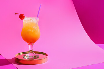 Glass of tasty Sex on the Beach cocktail on color background