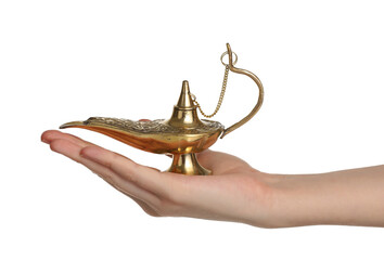 Hand with Aladdin lamp of wishes on white background