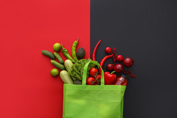 Eco bag with different scattered products on red and black background