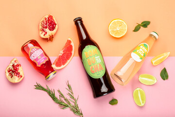 Composition with different kombucha tea in bottles and fruits on color background