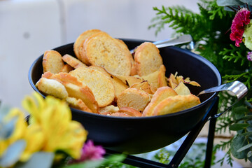 black basket with bread, baker's day, bread basket
