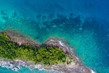 Fototapeta na wymiar Exotic sea beach island turquoise water with tropical green tree forest
