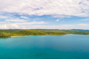 Exotic sea beach island turquoise water with tropical green tree forest