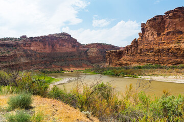 Fototapeta na wymiar Rocks and river landscape in a beautiful summer day. Location is Colorado river canyon in Utah, USA
