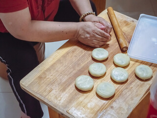 woman preparing dough