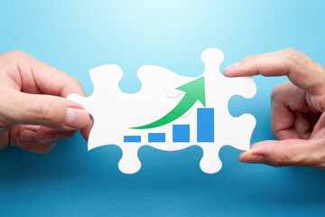 Solution for problem of growth. Two hands connecting jigsaw puzzle pieces. Illustration of graph...