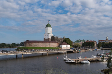 Obraz premium View of Vyborg castle and St. Olav’s tower. Summer season. European part of Russia.