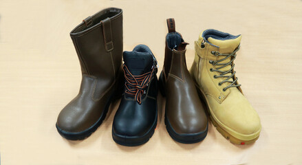 Safety shoes made of leather. These shoes have two functions, for fashion and to protect the feet. Workers wear these shoes when working to protect their feet from collisions with hard objects 
