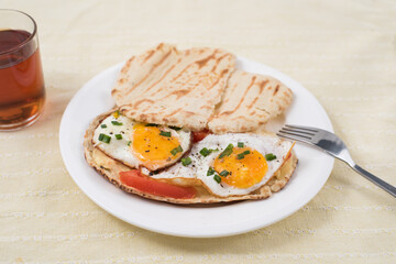 sunny side up eggs with pita bread