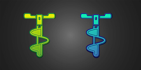 Green and blue Hand ice drill for winter fishing icon isolated on black background. Vector