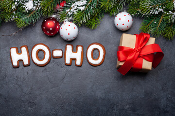 Christmas greeting card with homemade gingerbread HO-HO