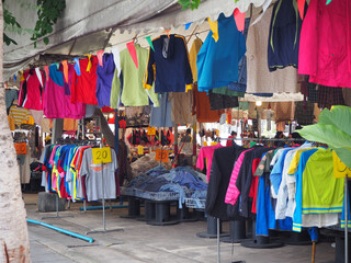 second hand clothes market cheap clothes Selling a bunch of products good condition together Selling inside the tent