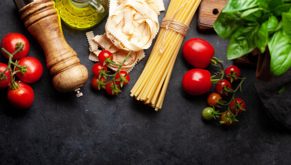 Italian cuisine food ingredients. Pasta, tomatoes, basil and spices