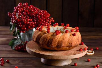 Traditional Christmas cranberry pie. Preparation of the festive table for the celebration of Christmas