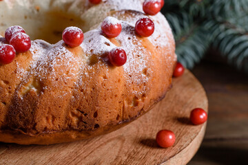 Traditional Christmas cranberry pie. Preparation of the festive table for the celebration of Christmas